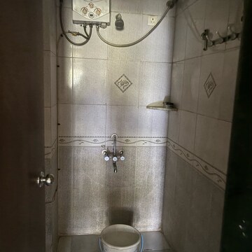 Bathroom in 1 BHK Apartment at Raheja Gardens, Netaji Nagar – for Rent