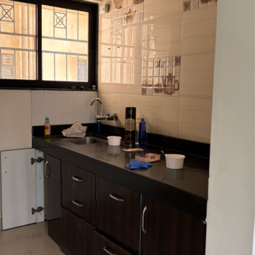 Kitchen in 1 BHK Apartment at Raheja Gardens, Netaji Nagar – for Rent