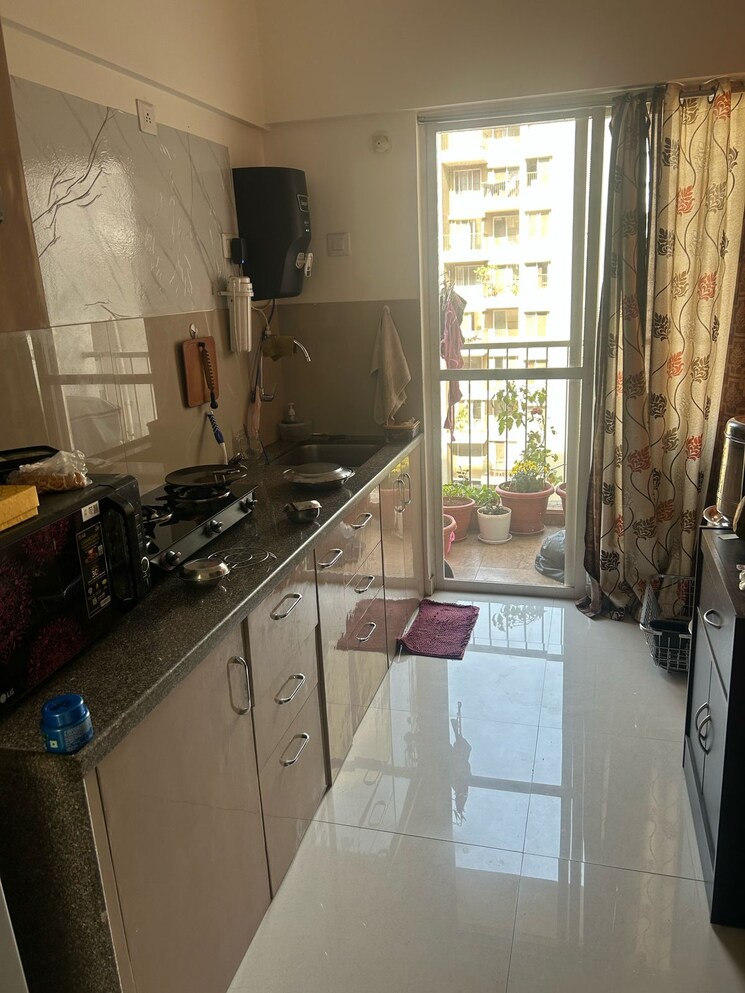 Kitchen, yash-wisteria 2 Bedroom 1087 Sq.Ft. Apartment In Wakad Pune 9766351