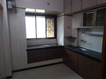 Kitchen in 1 BHK Apartment at Shapoorji Pallonji Siennaa, Kandivali East – for Rent