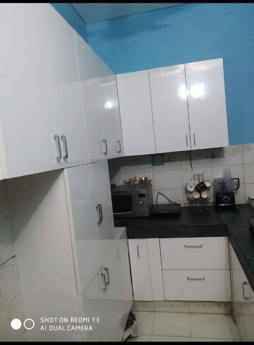 Kitchen in 3 BHK Builder Floor at Ansal Sushant Residency, Sushant Lok Iii – for Sale