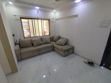 Living Room in 1 BHK Apartment at Om Sadguru CHS, Ic Colony – for Rent