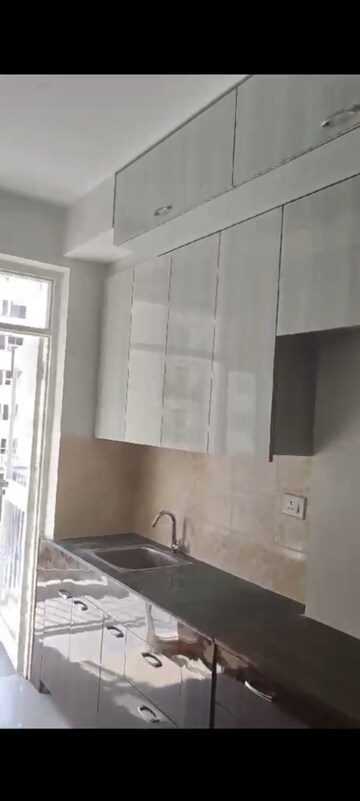 Kitchen in 2 BHK Apartment at Adani Aangan, Sector 89a – for Sale