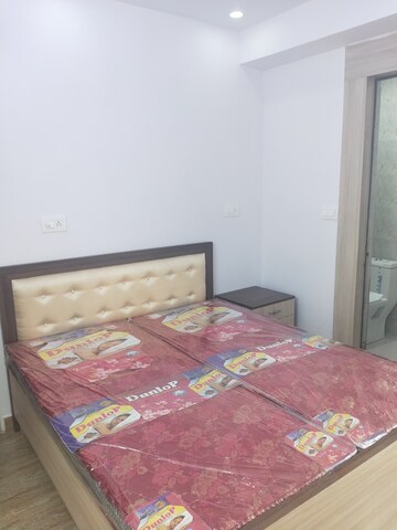 Bedroom in 1 RK Apartment at Dhoot Time Residency, Sector 63 – for Rent