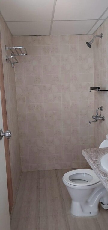 Bathroom in 2 BHK Apartment at Mahagun Mantra I, Sector 10 Greater Noida – for Rent