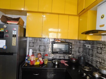 Kitchen in 1.5 BHK Apartment at Godrej Emerald, Ghodbunder Road – for Sale