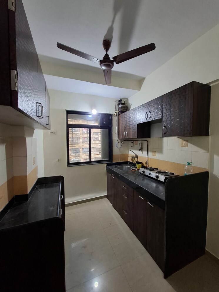 Kitchen, rna-ng-suncity-phase-ii 2 Bedroom 650 Sq.Ft. Apartment In Kandivali East Mumbai 9767471