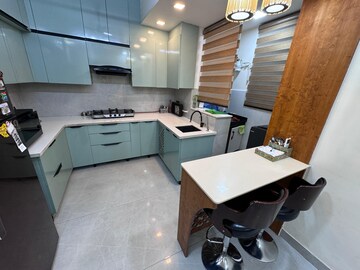 Kitchen in 3 BHK Apartment at Amrapali Platinum, Sector 119 – for Sale