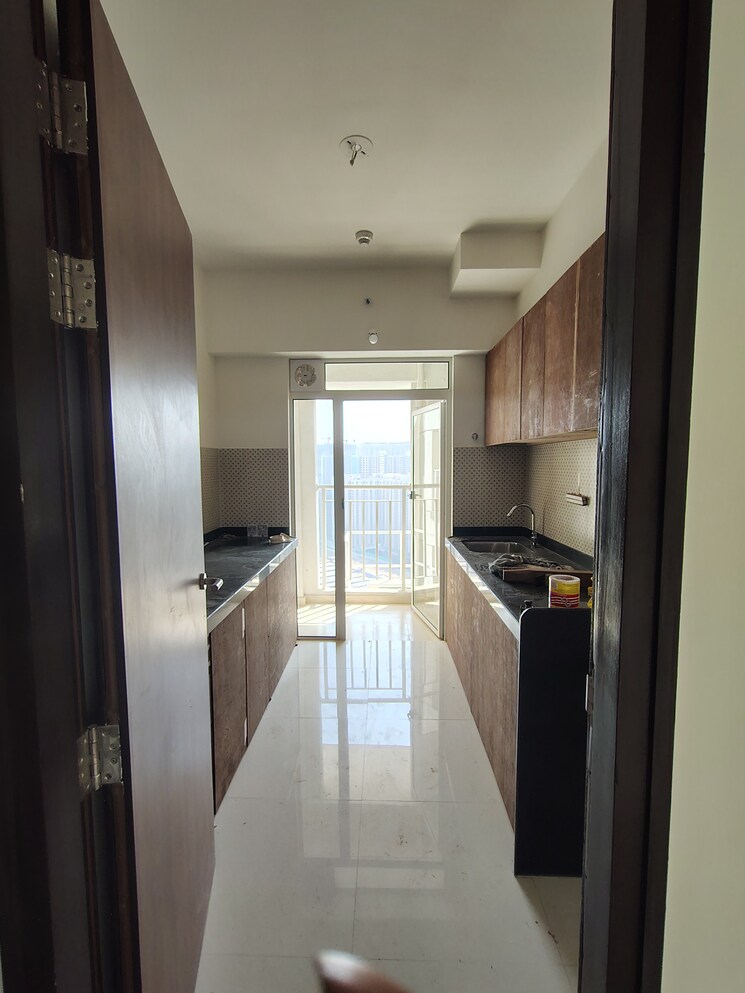 Kitchen, lodha-amara-tower-24-and-25 2 Bedroom 840 Sq.Ft. Apartment In Kolshet Road Thane 9768408