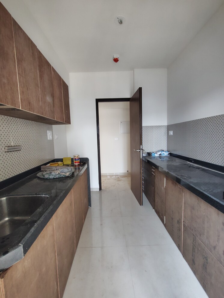 Kitchen, lodha-amara-tower-24-and-25 2 Bedroom 840 Sq.Ft. Apartment In Kolshet Road Thane 9768408