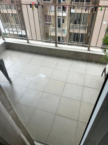 Balcony in 3.5 BHK Apartment at Emaar Palm Gardens, Sector 83 – for Rent