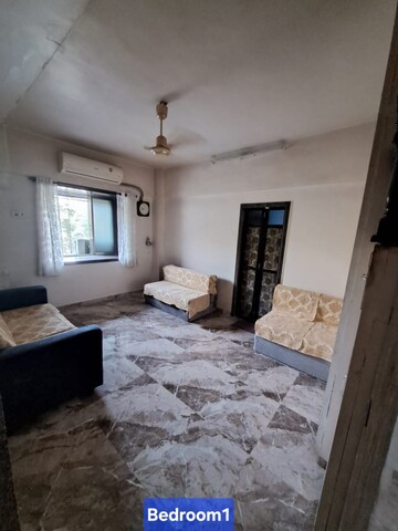 Bedroom in 2 BHK Apartment at New Haridas Park CHS, Dahisar West – for Sale