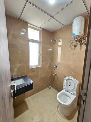 Bathroom in 2.5 BHK Apartment at Smart World Gems, Sector 89 – for Sale