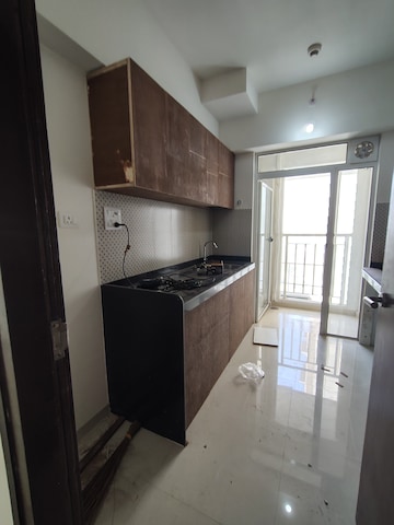 Kitchen in 2 BHK Apartment at Lodha Amara Tower 23, Kolshet Road – for Rent