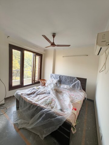 Bedroom in 2 BHK Builder Floor at Kalkaji – for Rent