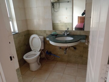 Bathroom in 3.5 BHK Apartment at Dhoot Time Residency, Sector 63 – for Rent