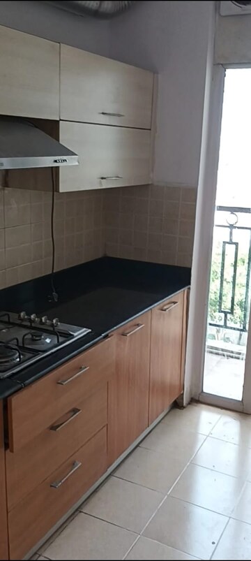 Kitchen in 3 BHK Apartment at Rishita Manhattan, Gomti Nagar – for Rent