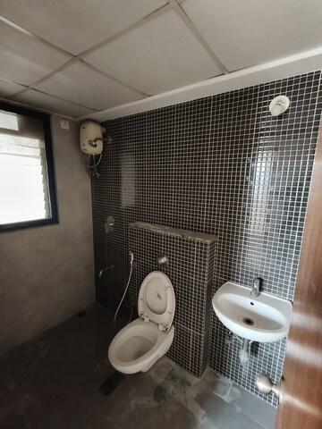 Bathroom in 1.5 BHK Apartment at Lodha Lakeshore Greens, Dombivli East – for Rent