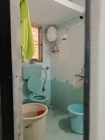 Bathroom in 1 BHK Apartment at Asmita Mogra CHS, Andheri East – for Rent
