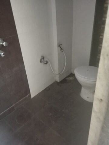 Bathroom in 1 BHK Apartment at Haware Dahlia, Kasarvadavali – for Rent