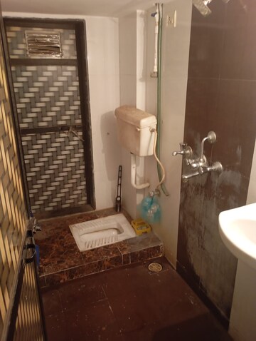 Bathroom in 1 BHK Apartment at Haware Dahlia, Kasarvadavali – for Rent