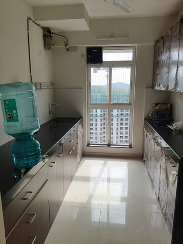 Kitchen in 1 BHK Apartment at Haware Dahlia, Kasarvadavali – for Rent