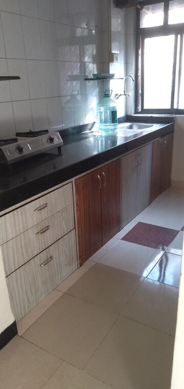 Kitchen in 1 BHK Apartment at KM Horizon Flora, Ghodbunder Road – for Rent