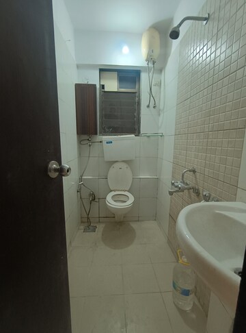 Bathroom in 2 BHK Apartment at Runwal Garden City, Balkum Pada – for Rent