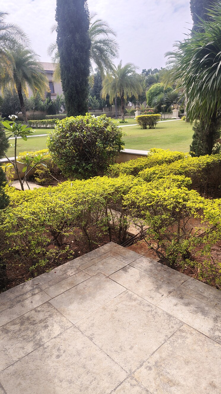 Garden, aditya-casa-grande 4 Bedroom 5174 Sq.Ft. Villa In Narsingi Hyderabad 9152860
