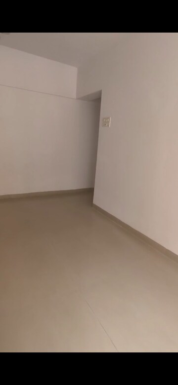 Living Room in 2 BHK Apartment at K Raheja Palm Court, Malad West – for Rent