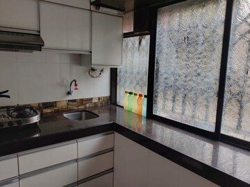 Kitchen in 2 BHK Apartment at Rajas CHS, Andheri East – for Rent