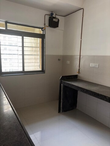 Kitchen in 2 BHK Apartment at Acme Ozone, Manpada – for Sale
