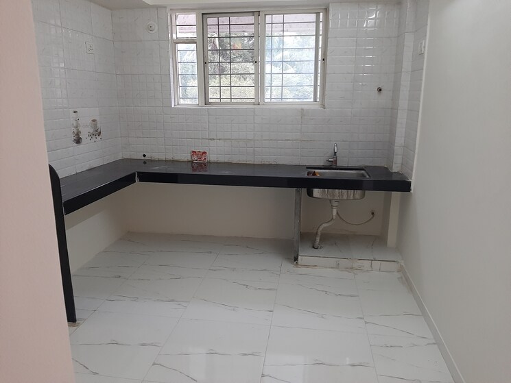 Kitchen, laxmi-ganga-heights 2 Bedroom 950 Sq.Ft. Apartment In Anand Nagar Pune 9772456