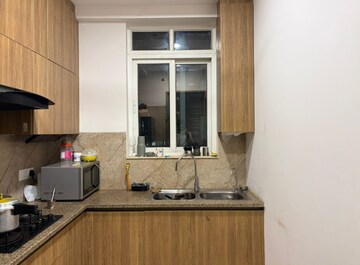 Kitchen in 2 BHK Apartment at Ambience Creacions, Sector 22 – for Rent