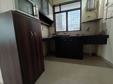 Kitchen in 1 BHK Apartment at Pioneer Park, Kolshet Road – for Rent