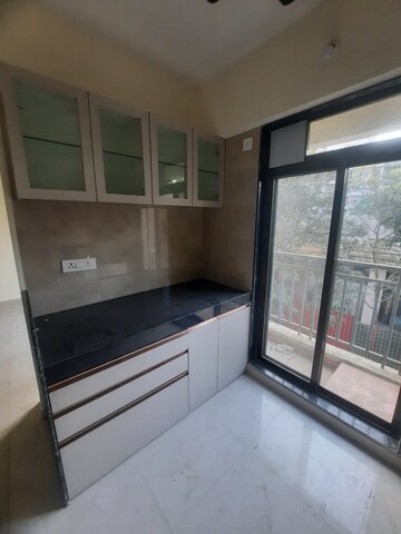 Kitchen in 2 BHK Apartment at K M Horizon Palms, Owale – for Rent