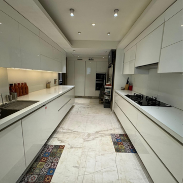 Kitchen in 4 BHK Apartment at Raiaskaran Parthenon, Bhudargarh Colony – for Sale