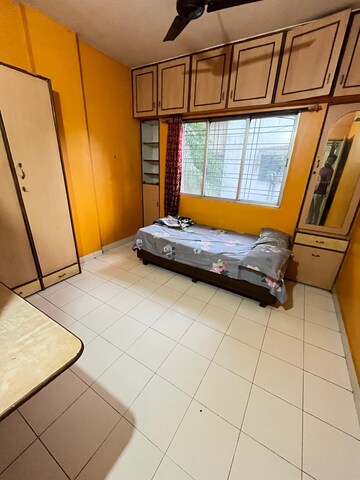 Bedroom in 1 BHK Apartment at Dhanlaxmi Park, Kothrud – for Rent