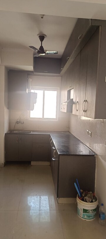 Kitchen in 3 BHK Apartment at Amrapali Crystal Homes, Sector 76 – for Rent