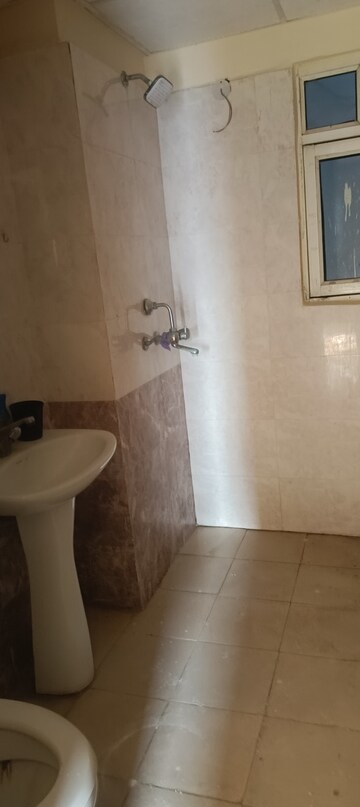 Bathroom in 3 BHK Apartment at Gardenia Golf City, Sector 75 – for Rent