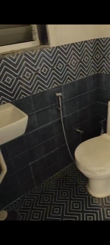 Bathroom in 1 BHK Apartment at Krishvi Escape, Kalbadevi – for Rent