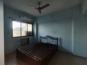 Bedroom in 2 BHK Apartment at Puranik City, Kasarvadavali – for Rent