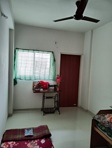 Living Room in 2 BHK Apartment at Adgaon – for Sale