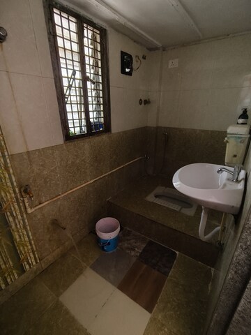 Bathroom in 1 BHK Apartment at Satellite Garden, Goregaon East – for Rent