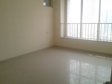 Room in 2.5 BHK Apartment at Rustomjee OZone, Goregaon West – for Sale