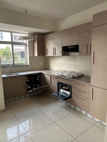 Kitchen in 4 BHK Villa at Godrej Golf Links Crest, Sector 27 Yamuna Expressway – for Rent