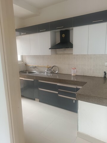 Kitchen in 2 BHK Apartment at ATS Allure, Sector 22d Yamuna Expressway – for Rent