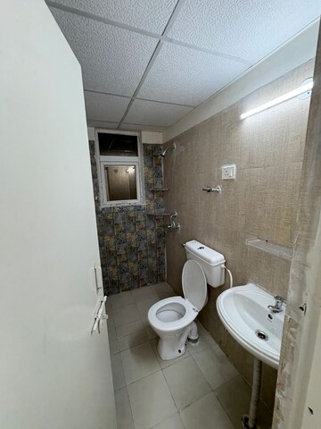 Bathroom in 2 BHK Apartment at Signature The Millennia 3, Sector 37d – for Rent