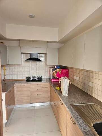 Kitchen in 4 BHK Apartment at Godrej Windsor, Sector 27 Yamuna Expressway – for Rent