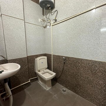 Bathroom in 3 BHK Apartment at Sarvodaya Enclave – for Rent